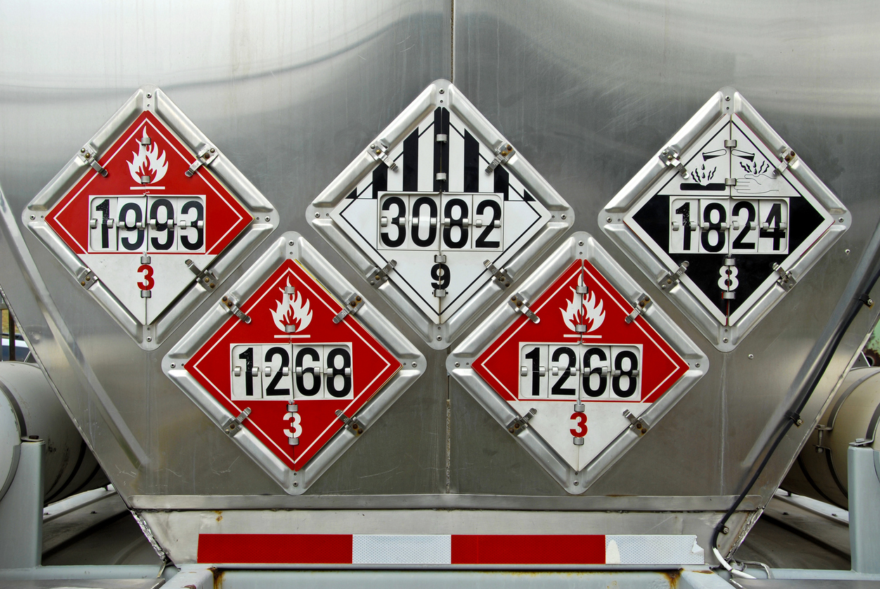 USDOT Hazardous Materials Transportation Placards on rear of a Fuel Tanker